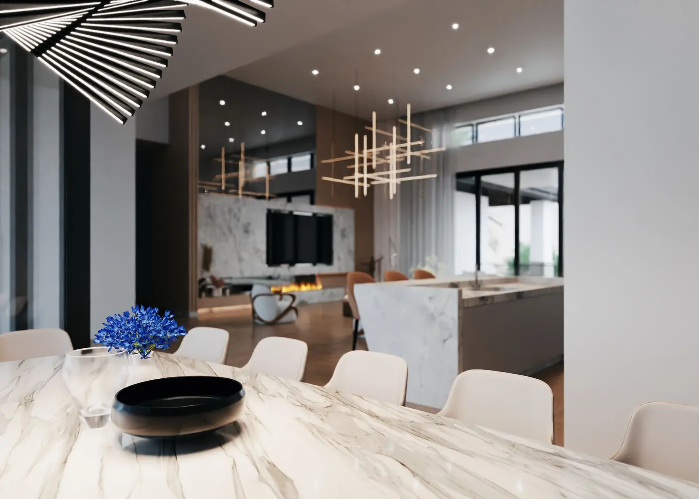 Dining table in the foreground looking through to the living room and the kitchen island