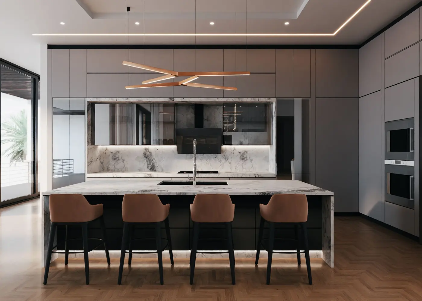Kitchen with a book matched island, full height cabinetry and wall ovens