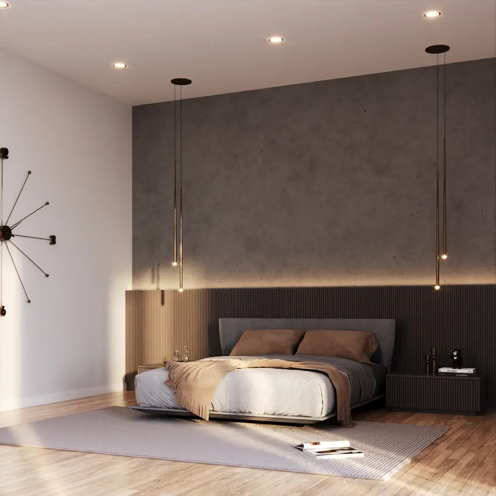 Primary bedroom from the foot of the bed with the fluted headboard wall and pendant lighting