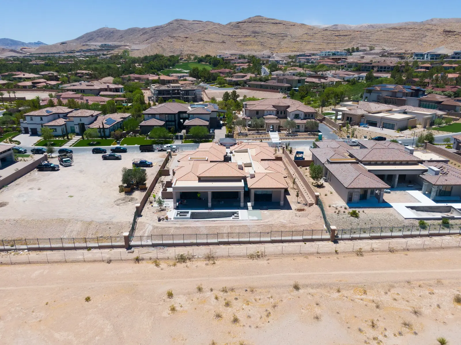 Aerial from behind the house showing the covered patio, pool and the view fence along the rear boundary