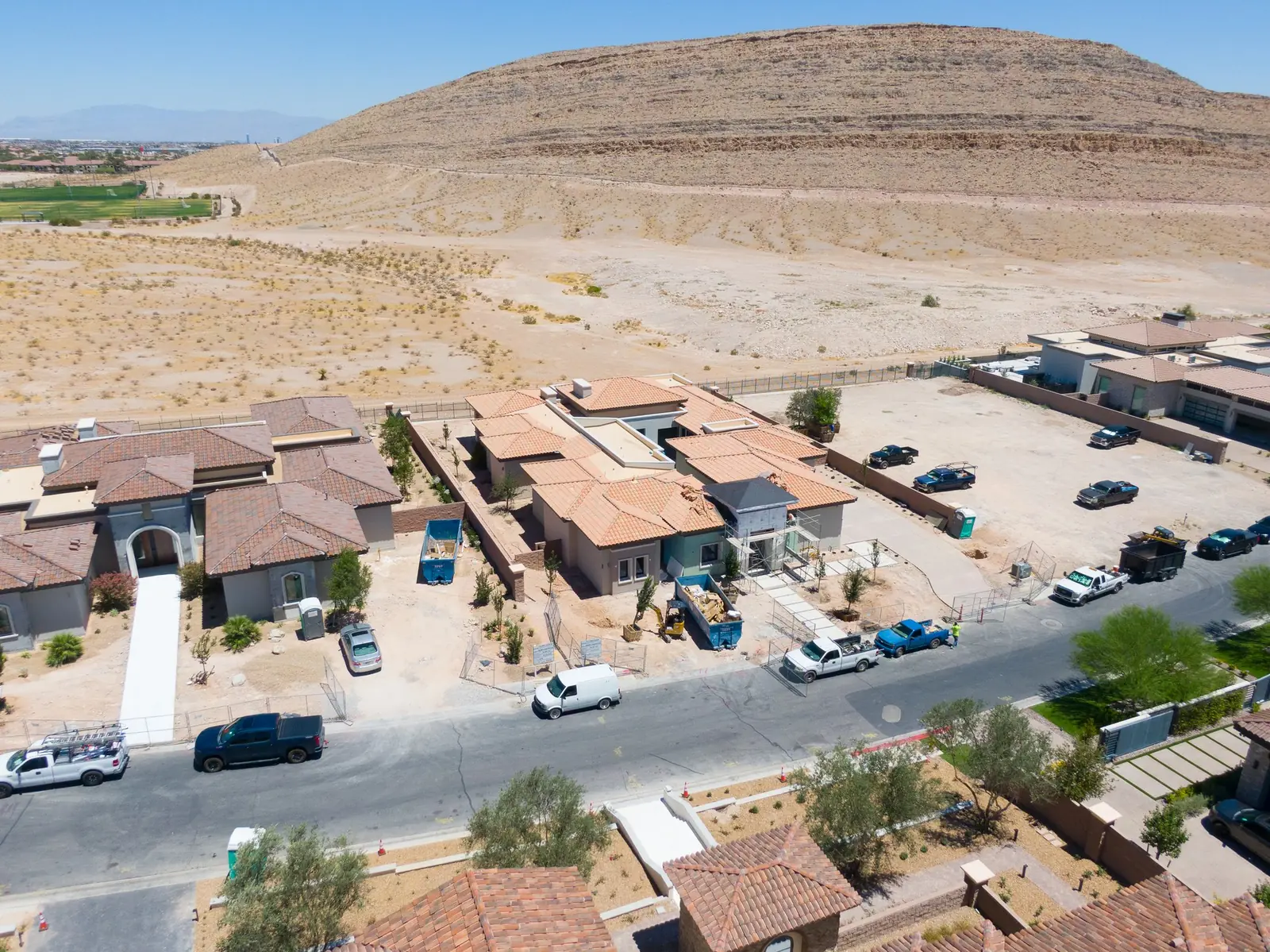 Aerial of the street approach with the ridge behind