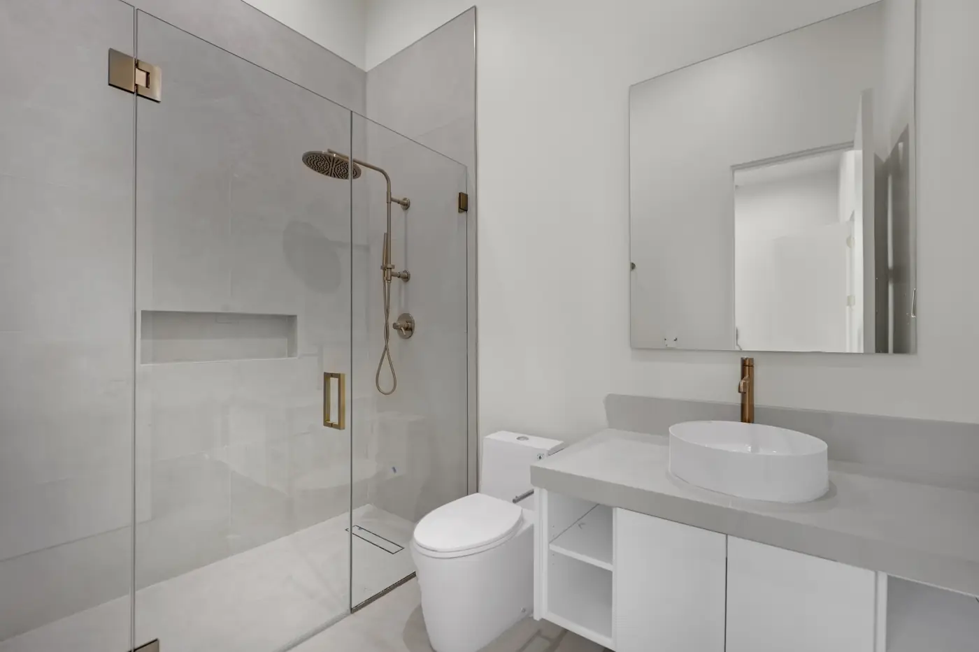 Bath with a walk in shower and a floating vanity
