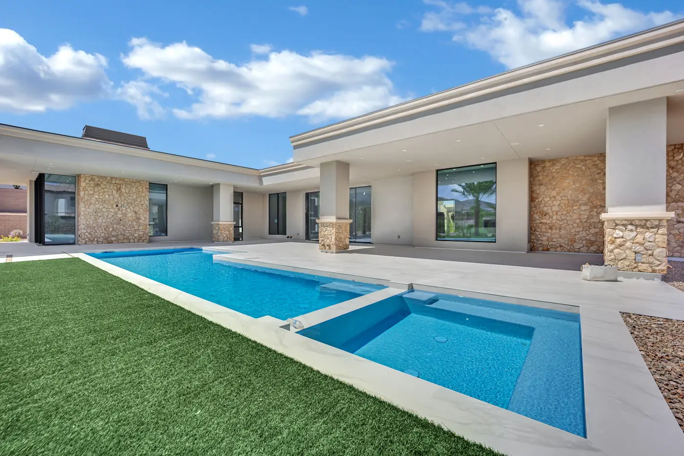 Pool and spa with turf either side