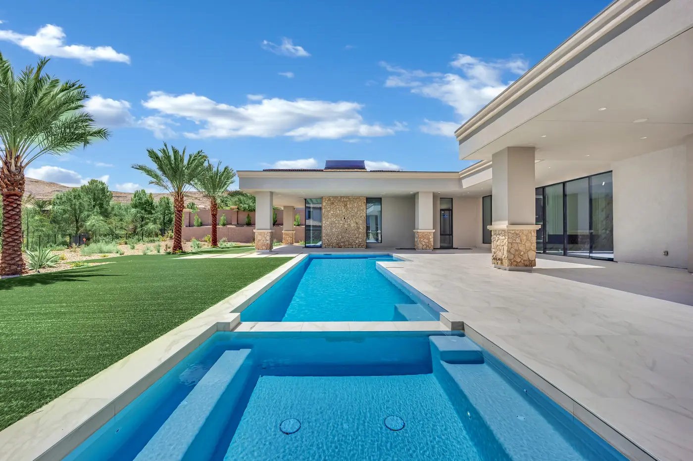 Long view down the pool toward the house