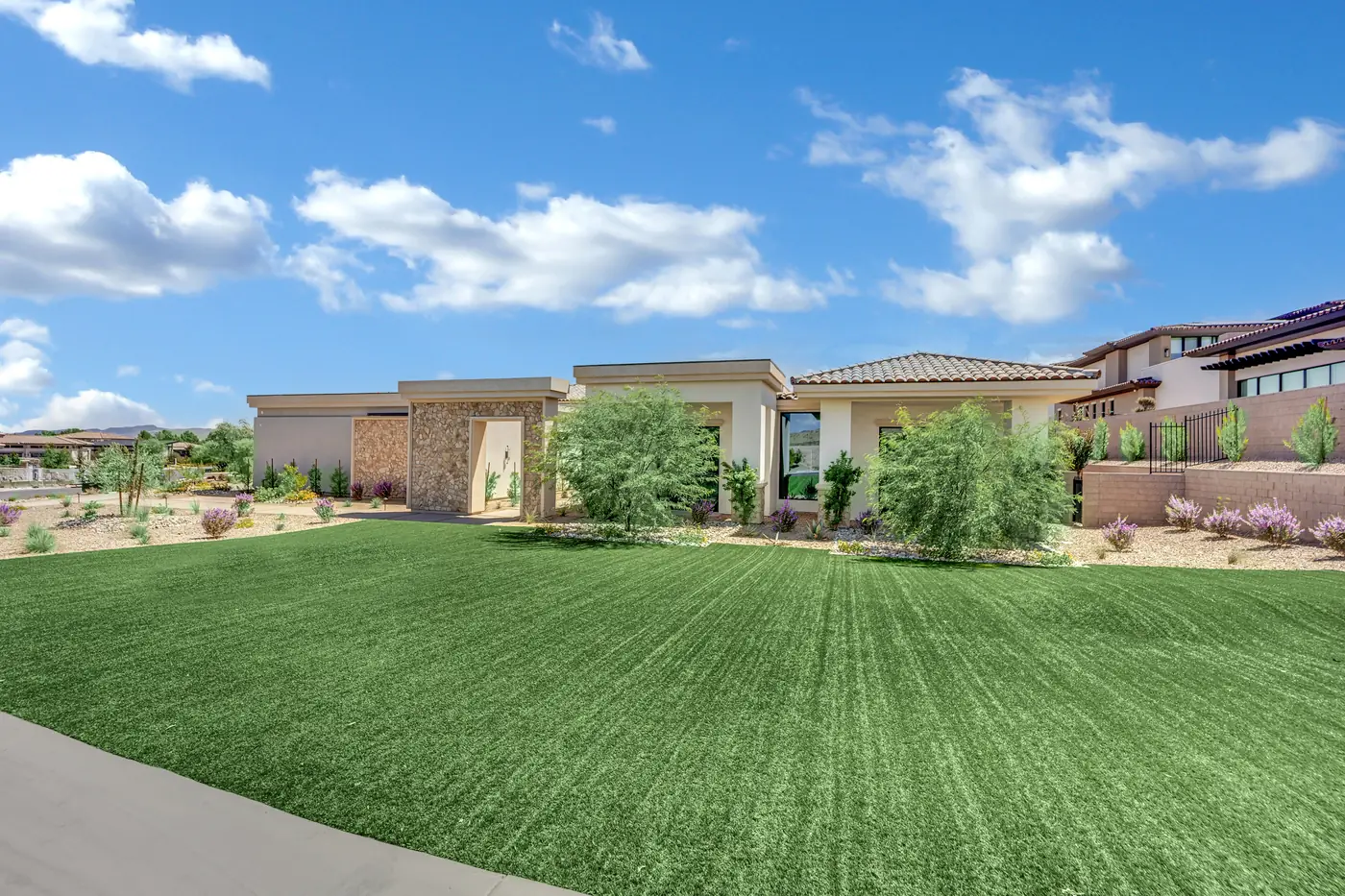 Front lawn running to the perimeter wall